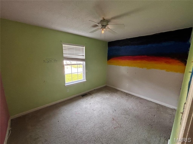 7764 Locust Dr, Barnhart, MO 63012 - unfurnished room featuring a ceiling fan, carpet floors, and baseboards