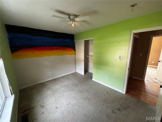 7764 Locust Dr, Barnhart, MO 63012 - unfurnished bedroom featuring baseboards, carpet, and a ceiling fan