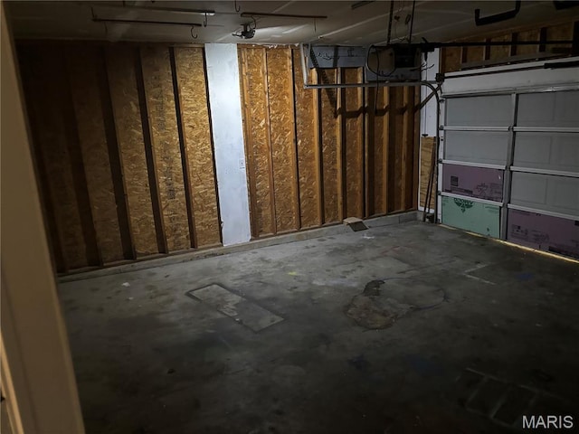 7764 Locust Dr, Barnhart, MO 63012 - garage featuring a garage door opener