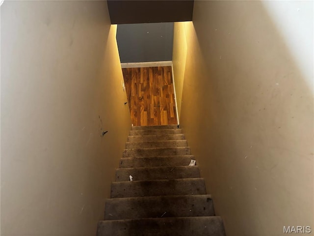 7764 Locust Dr, Barnhart, MO 63012 - staircase with wood finished floors