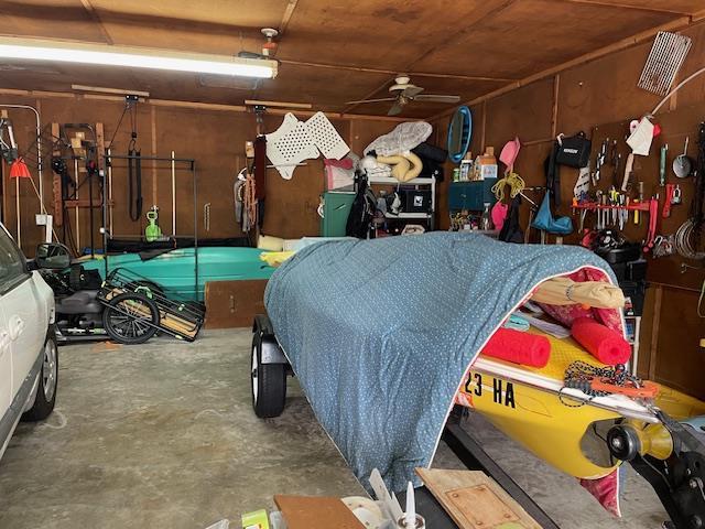 212 E N St, Benton, MO 63736 - garage featuring a ceiling fan
