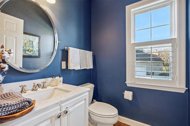 884 Craig Forest Ln, Saint Louis, MO 63122 - bathroom featuring toilet, vanity, and baseboards