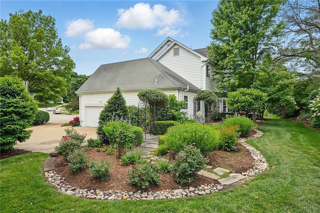 884 Craig Forest Ln, Saint Louis, MO 63122 - view of property exterior with a garage, driveway, and a lawn
