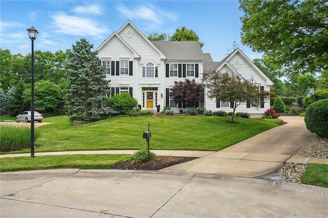 884 Craig Forest Ln, Saint Louis, MO 63122 - colonial inspired home with a front lawn