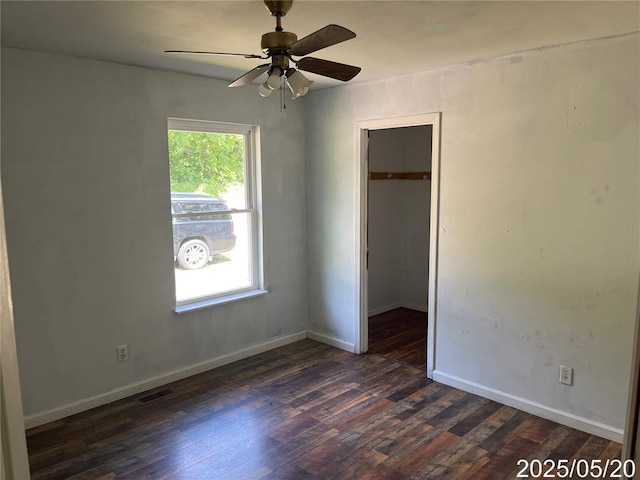 13083 Hencher Rd, De Soto, MO 63020 - unfurnished bedroom featuring dark wood-type flooring, a closet, and baseboards