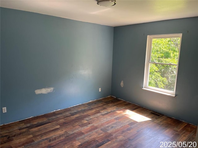 13083 Hencher Rd, De Soto, MO 63020 - spare room featuring dark wood finished floors