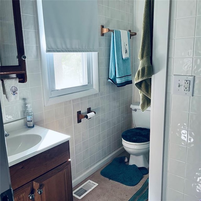 6308 Eagle Ln Unit 6300, French Village, MO 63036 - bathroom with tile walls, toilet, and vanity