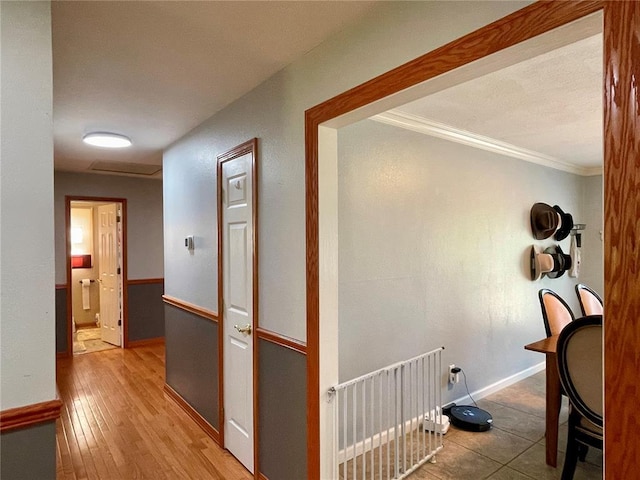 17250 Brewster Ln, Crocker, MO 65452 - hall with ornamental molding, baseboards, and wood finished floors