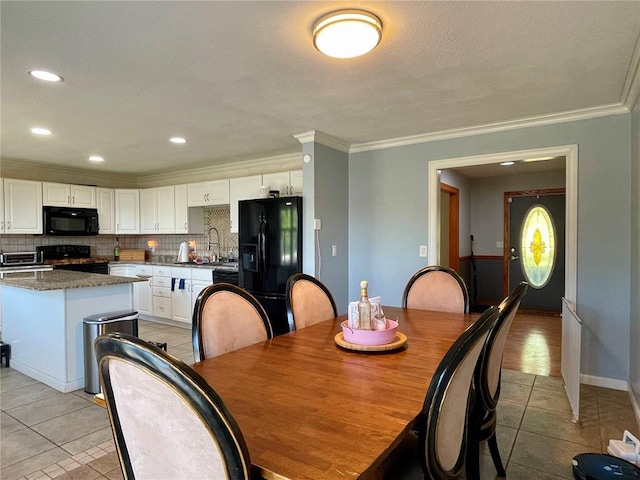 17250 Brewster Ln, Crocker, MO 65452 - dining area featuring light tile patterned floors, crown molding, and recessed lighting