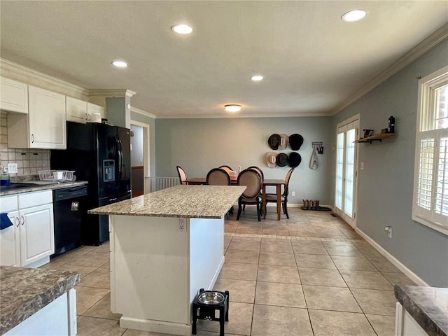 17250 Brewster Ln, Crocker, MO 65452 - kitchen featuring black appliances, light tile patterned floors, decorative backsplash, recessed lighting, and white cabinets