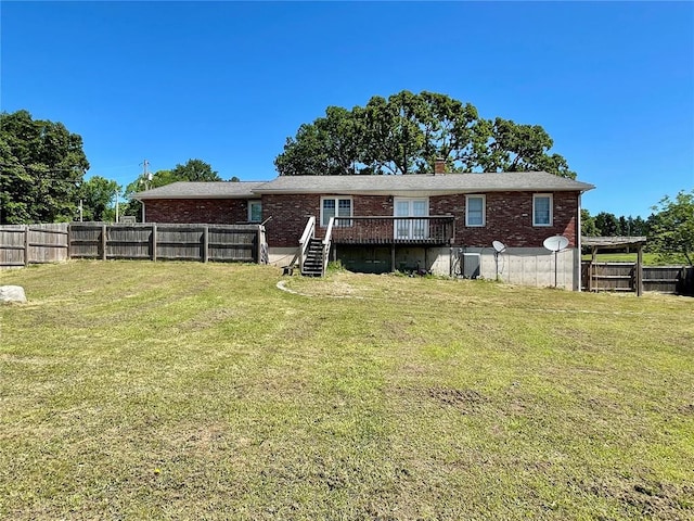 17250 Brewster Ln, Crocker, MO 65452 - rear view of house featuring a wooden deck, brick siding, central AC, and stairs