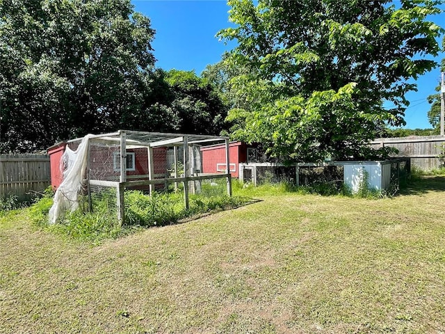 17250 Brewster Ln, Crocker, MO 65452 - view of yard with exterior structure and an outbuilding