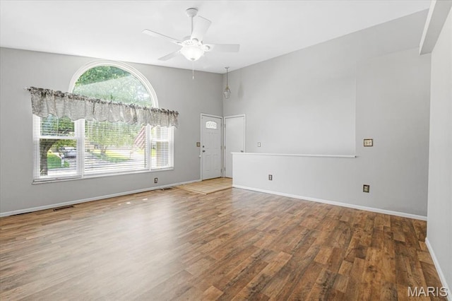 459 Xavier Ct, Valley Park, MO 63088 - empty room with wood finished floors, ceiling fan, and baseboards