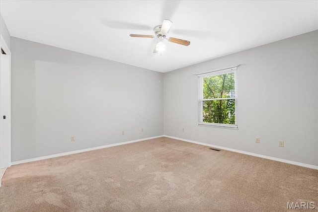 459 Xavier Ct, Valley Park, MO 63088 - unfurnished room with carpet flooring, a ceiling fan, and baseboards