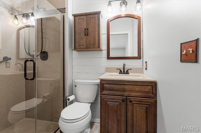 459 Xavier Ct, Valley Park, MO 63088 - bathroom featuring toilet, vanity, and a stall shower