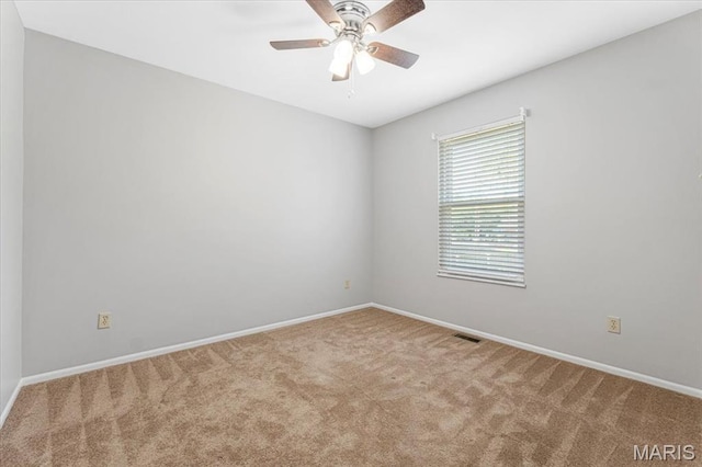 459 Xavier Ct, Valley Park, MO 63088 - carpeted spare room featuring baseboards and a ceiling fan