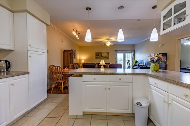 1300 N Main St Unit 213, Sikeston, MO 63801 - kitchen with light tile patterned flooring, ceiling fan, crown molding, open floor plan, and decorative light fixtures