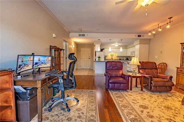 1300 N Main St Unit 213, Sikeston, MO 63801 - office space with wood finished floors, a ceiling fan, and crown molding