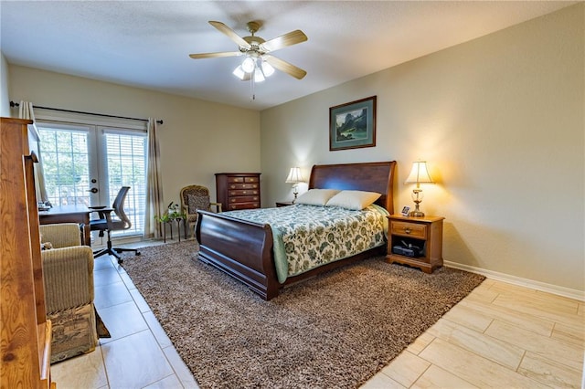 1300 N Main St Unit 213, Sikeston, MO 63801 - bedroom featuring access to exterior, french doors, baseboards, ceiling fan, and a desk