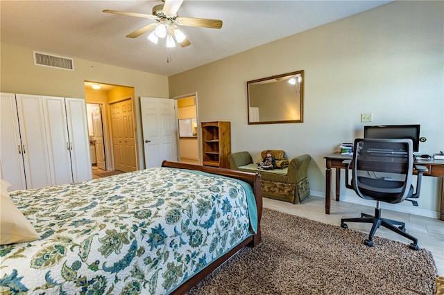 1300 N Main St Unit 213, Sikeston, MO 63801 - bedroom featuring baseboards, a ceiling fan, and an office area