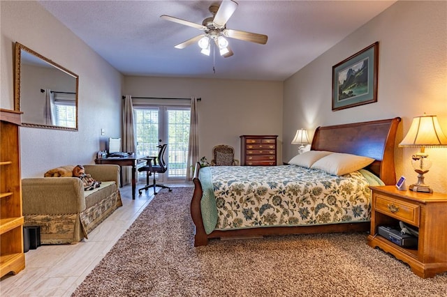 1300 N Main St Unit 213, Sikeston, MO 63801 - bedroom featuring access to exterior, a desk, and ceiling fan