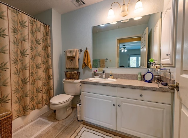 1300 N Main St Unit 213, Sikeston, MO 63801 - bathroom with vanity, toilet, and a ceiling fan