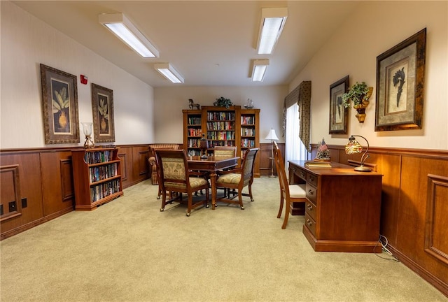 1300 N Main St Unit 213, Sikeston, MO 63801 - dining area featuring light colored carpet and a wainscoted wall