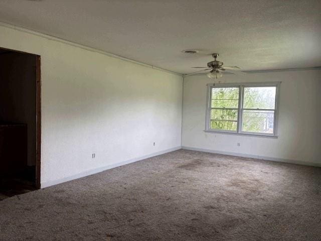 15606 County Road 624, Dexter, MO 63841 - empty room with carpet, a ceiling fan, and baseboards