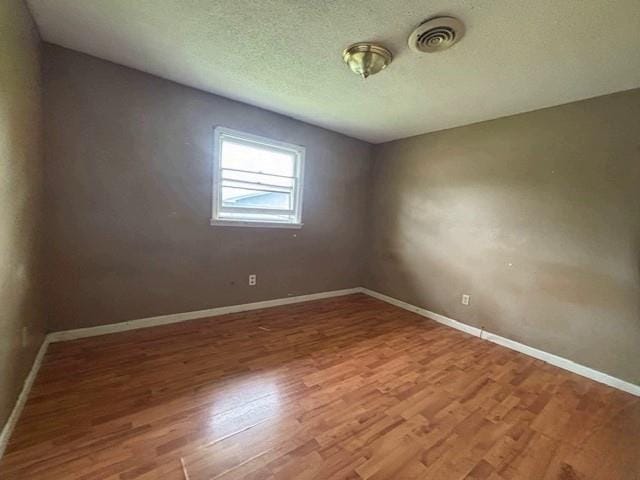 15606 County Road 624, Dexter, MO 63841 - unfurnished room featuring wood finished floors and baseboards