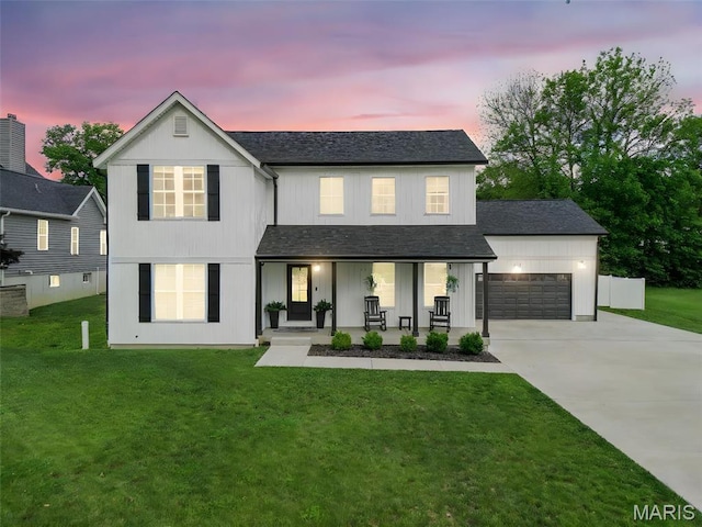 28 Millwell Dr, Maryland Heights, MO 63043 - modern farmhouse with covered porch, an attached garage, concrete driveway, a front lawn, and a shingled roof