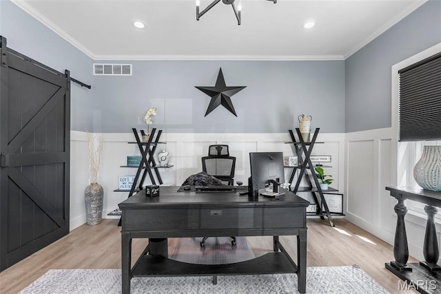 28 Millwell Dr, Maryland Heights, MO 63043 - office space with light wood-style floors, crown molding, a barn door, a decorative wall, and a wainscoted wall
