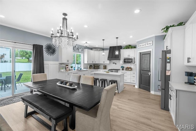 28 Millwell Dr, Maryland Heights, MO 63043 - dining space featuring a chandelier, crown molding, recessed lighting, and light wood-type flooring