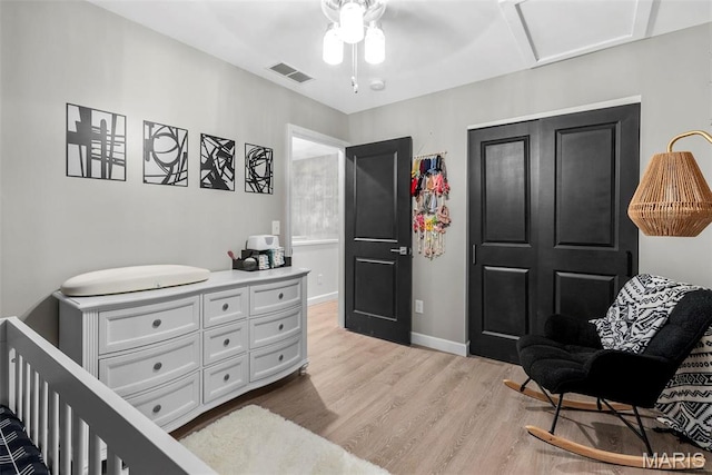28 Millwell Dr, Maryland Heights, MO 63043 - bedroom featuring wood finished floors, ceiling fan, and attic access