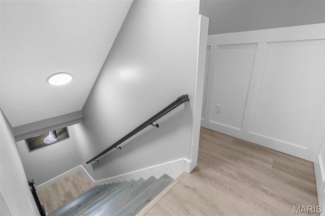 28 Millwell Dr, Maryland Heights, MO 63043 - stairs featuring wood finished floors and baseboards