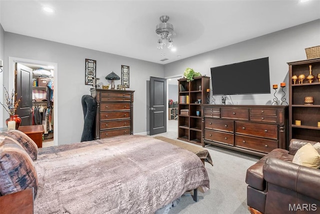 28 Millwell Dr, Maryland Heights, MO 63043 - bedroom with a walk in closet, carpet, a closet, and recessed lighting