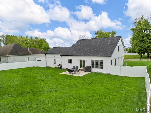 28 Millwell Dr, Maryland Heights, MO 63043 - back of property with a patio area, a fenced backyard, and roof with shingles