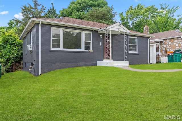 1937 N Hanley Rd, Saint Louis, MO 63114 - view of front of home featuring brick siding and a chimney