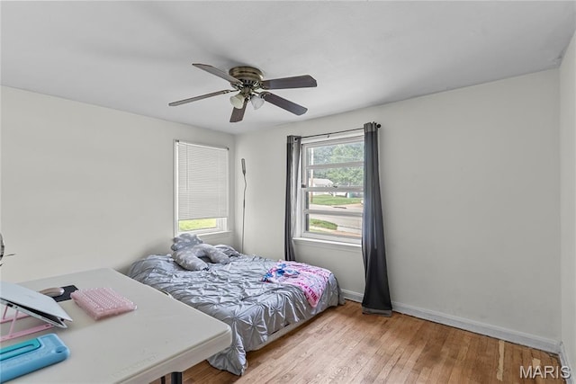 1937 N Hanley Rd, Saint Louis, MO 63114 - bedroom featuring wood finished floors and a ceiling fan