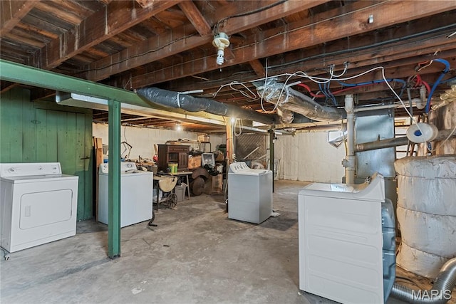 1937 N Hanley Rd, Saint Louis, MO 63114 - unfinished basement with washer and clothes dryer