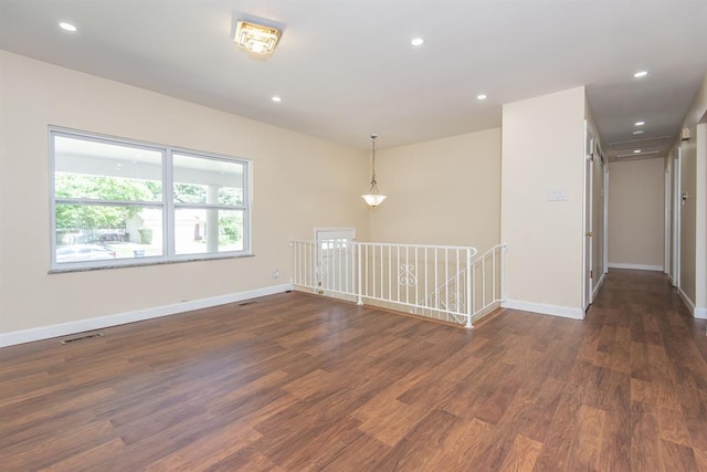 505 Stephanie Ln, Manchester, MO 63011 - spare room with dark wood-style floors, recessed lighting, and baseboards