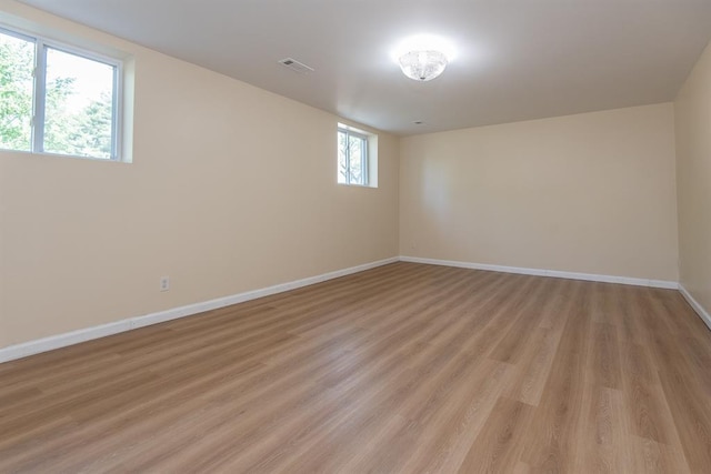 505 Stephanie Ln, Manchester, MO 63011 - spare room with baseboards and light wood-style flooring