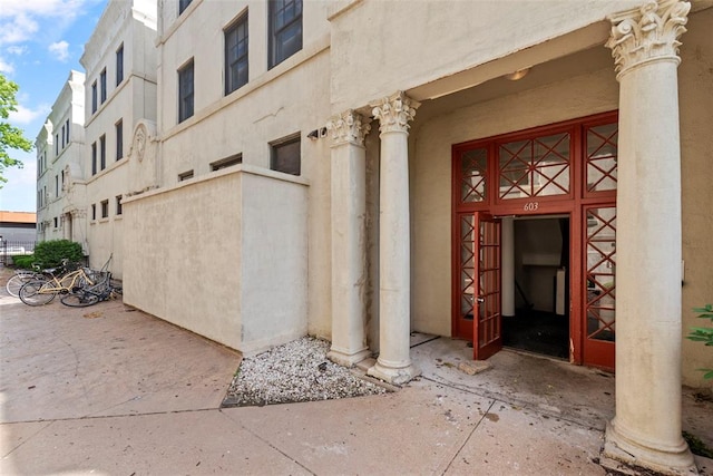 603 Westgate Ave Unit 603E, Saint Louis, MO 63130 - view of exterior entry with stucco siding