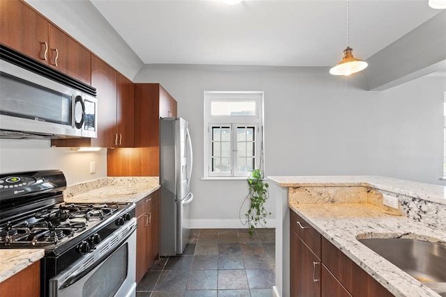 603 Westgate Ave Unit 603E, Saint Louis, MO 63130 - kitchen with appliances with stainless steel finishes, baseboards, light stone countertops, and dark stone finish flooring
