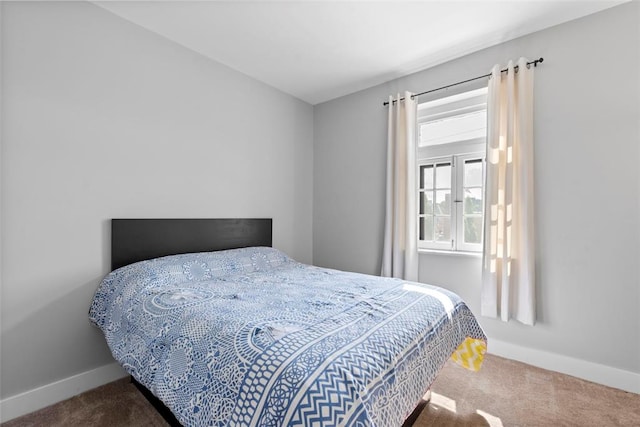 603 Westgate Ave Unit 603E, Saint Louis, MO 63130 - bedroom with carpet floors and baseboards