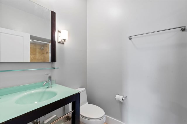 603 Westgate Ave Unit 603E, Saint Louis, MO 63130 - bathroom with toilet, vanity, and a shower