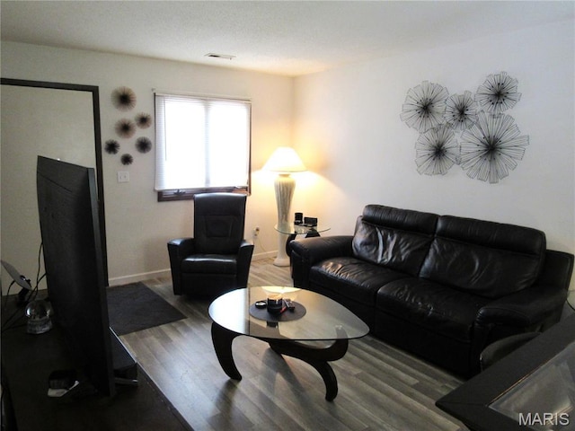 1826 Muny Vista Ct Unit B, Alton, IL 62002 - living room featuring wood finished floors and baseboards