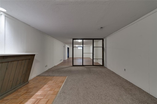 204 Chestnut Dr, Saint Charles, MO 63301 - empty room featuring a textured ceiling