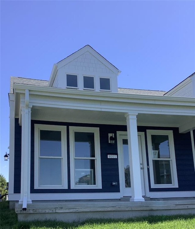 4001 Marais Temps Clair Dr, Saint Charles, MO 63304 - view of exterior entry featuring a porch