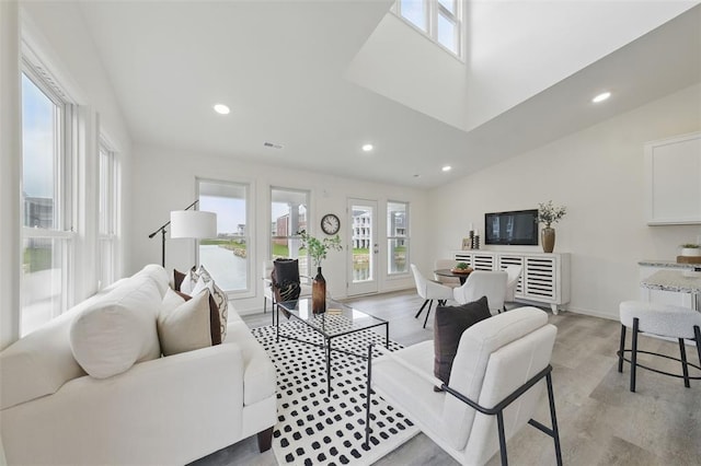 4001 Marais Temps Clair Dr, Saint Charles, MO 63304 - living area with plenty of natural light, light wood-style floors, recessed lighting, and baseboards