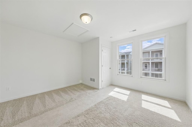 4001 Marais Temps Clair Dr, Saint Charles, MO 63304 - empty room with attic access, light carpet, and baseboards